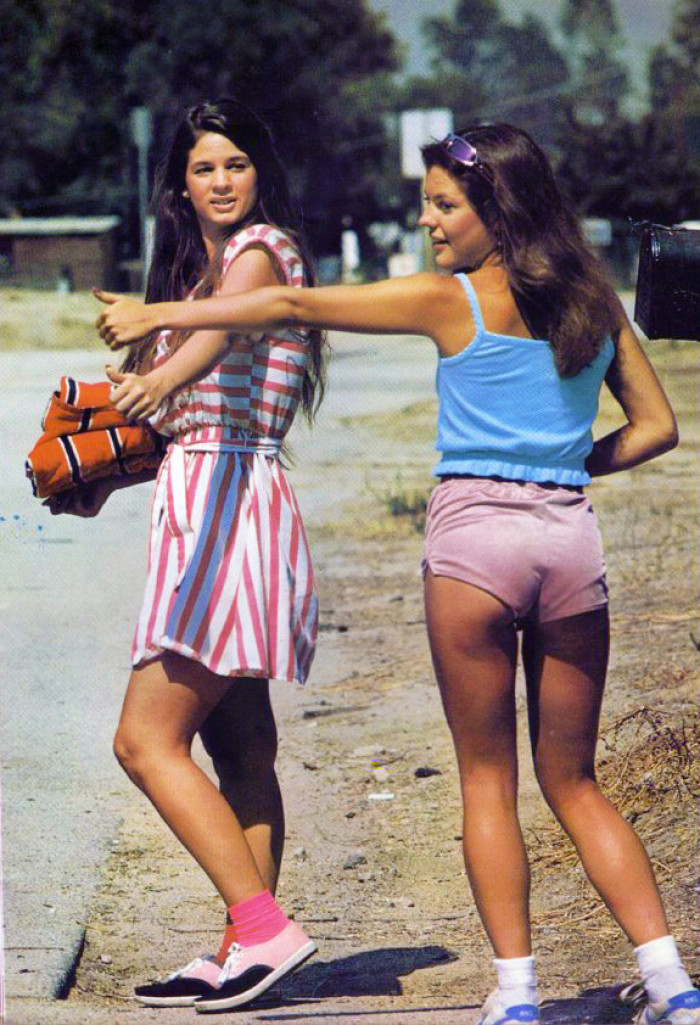 This photo of 2 young girls hitchhiking shows how common it was in the 70's