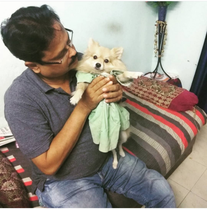 1. "My dad dressed "the dog he didn't want" in my childhood dress he kept for his first granddaughter."