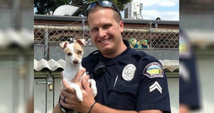 Here's Bubba carried by his hero, Officer Laurich.