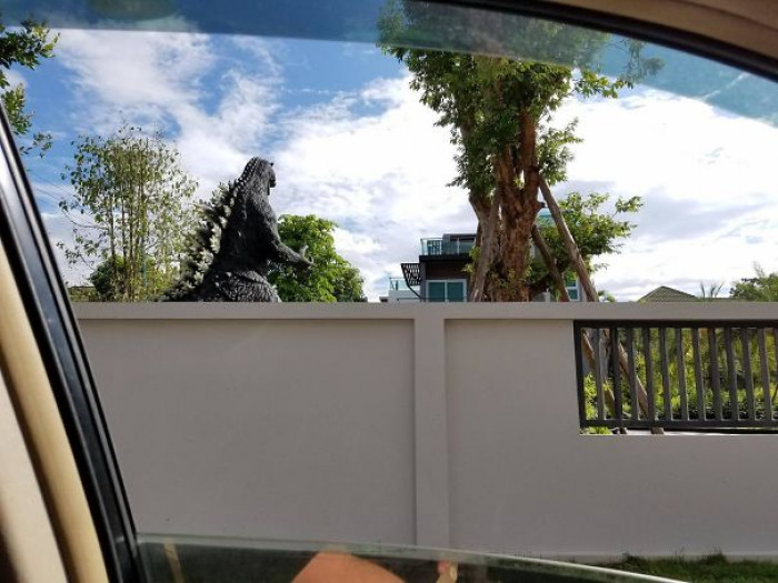 #46 Neighbor Has A Giant Godzilla Statue In His Yard