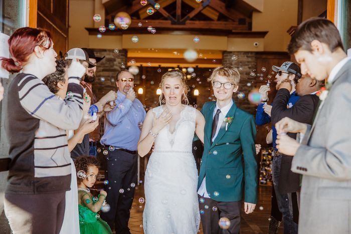 A bubble flying into the brides eye makes for a great wedding photo