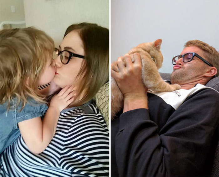 Twin-style couple pose with a man holding his cat like a baby