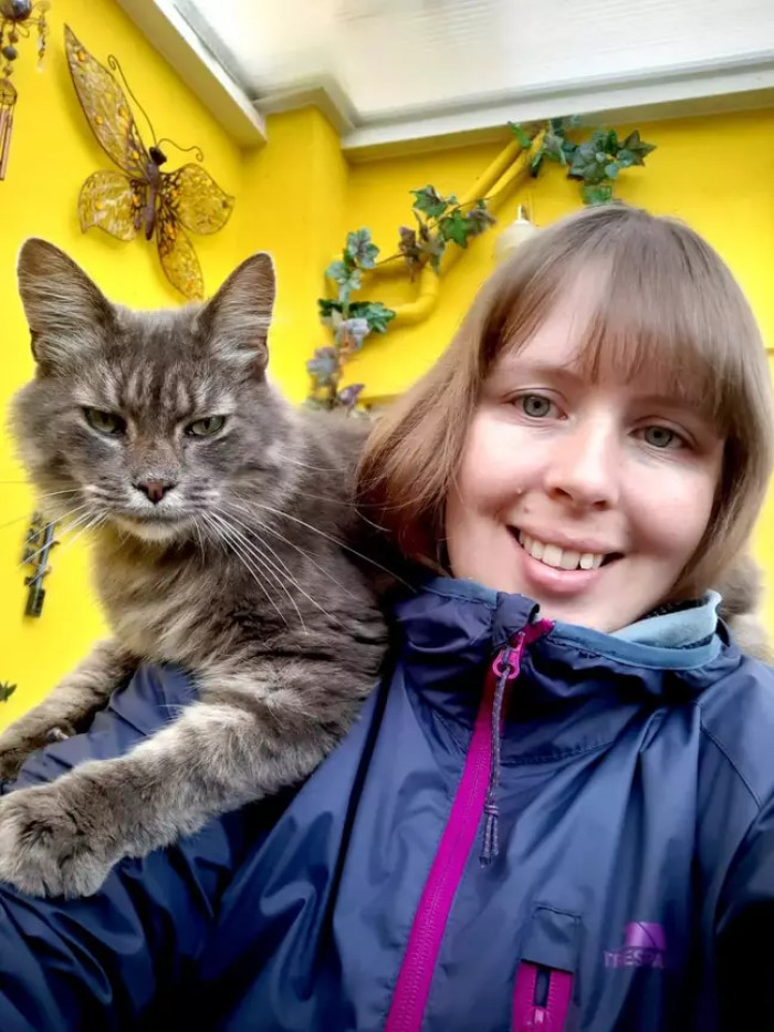 Kathy with one of her numerous pets