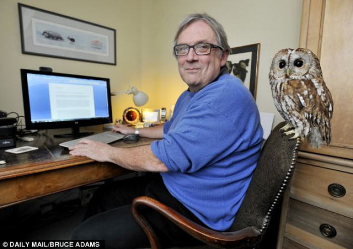 Bertie helping Mr. Middleton with his work on computer