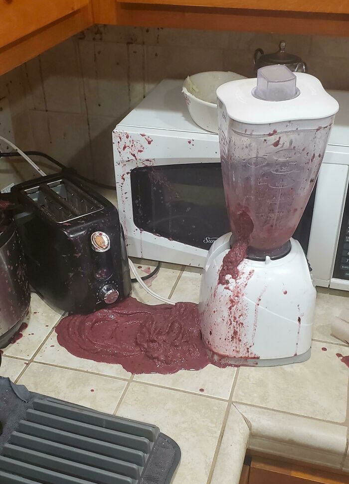 14-year-old stirs smoothie with a metal spoon while the blender's still blending.