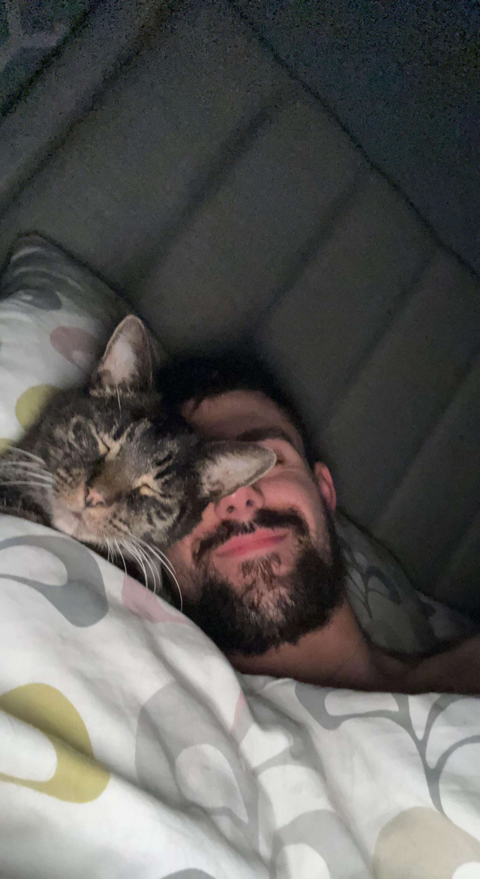 He adores sleeping in bed with his dad.