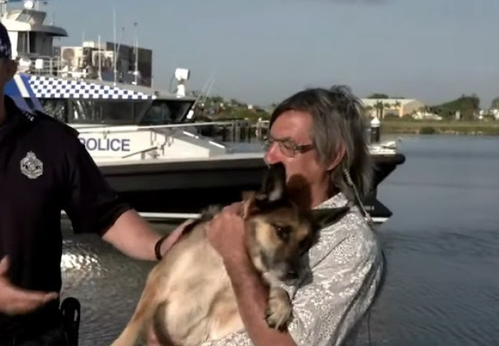 The man decided to rush to the rescue and take the dog out of the water and bring it to the shore