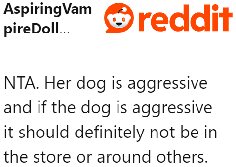 The entitled woman's dog is aggressive. It shouldn't be accompanying her to a public place.