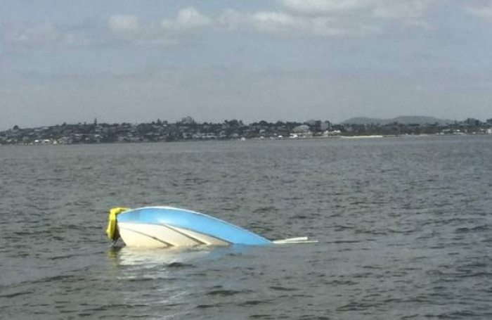 A fisherman’s dog, Heidi, was spotted floating next to a tackle box, a wetsuit, and other items from a boat that had capsized