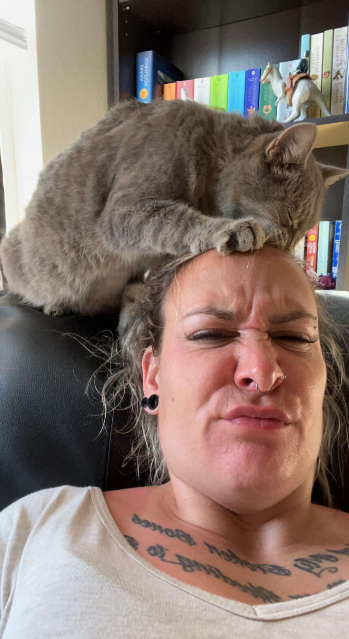 She loves "doing" Jessica's hair. “I say she is not my cat, but she has clearly chosen me as her person,” Jessica says.