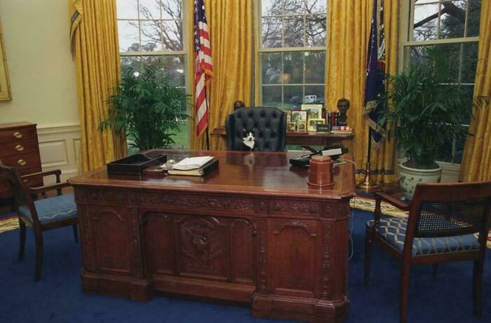 "Socks The Cat Sitting Behind President Clinton’s Desk In The Oval Office. January 7, 1994"