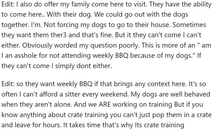 Group gathered outdoors at a community social event, pets included among attendees