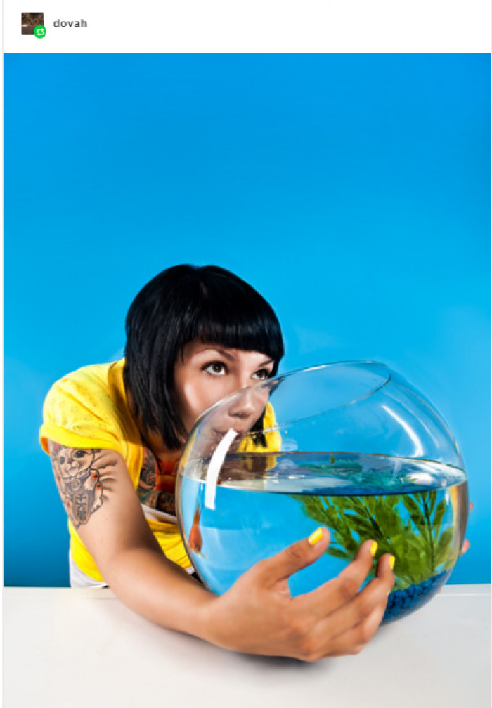 Goldfish in a bowl, awkwardly staged like a demonic possession scene