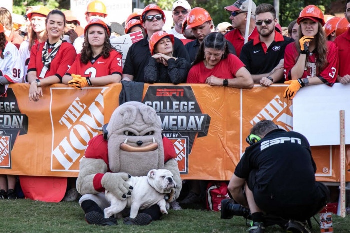 "They played for several minutes. You could see the pup was trying to lick his face underneath the mask. It was quite cute."
