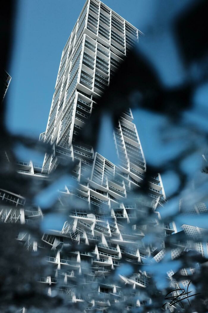 26. ITAP Of A Building Reflected On A Shattered Mirror On The Street