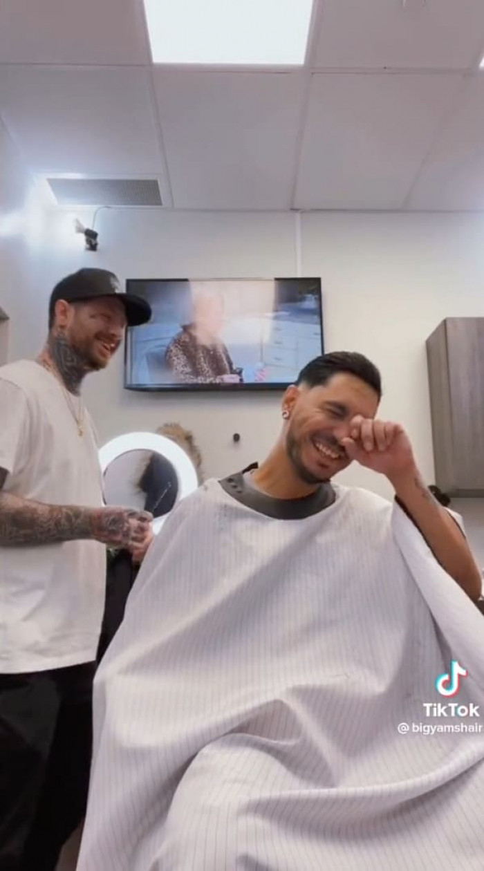 But this barber had taken things up a notch and it's all smiles from everyone