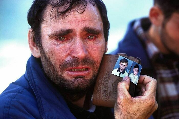 11. A father looking for his two missing sons that went missing during the war, Mitrovica, Kosovo, 1999. 🇽🇰