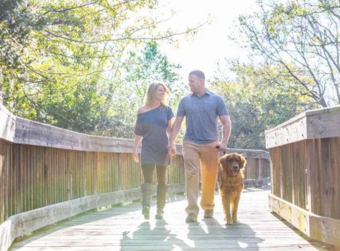 This gentle Golden Retriever is extremely affectionate and attentive with Justin