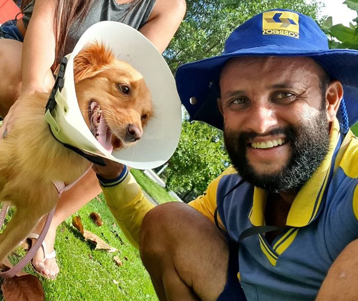 36. The cone of shame doesn't take away his happiness for seeing Antunes