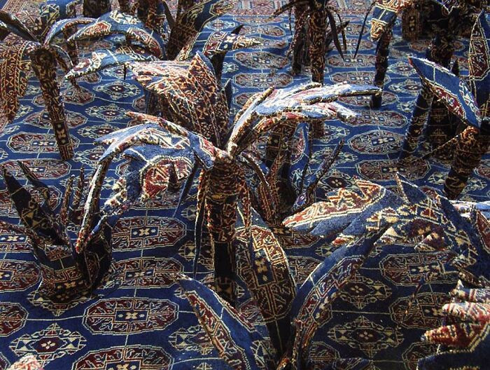 Red lion and wild dog sundown sculpture, Persian carpet escape illusion artwork