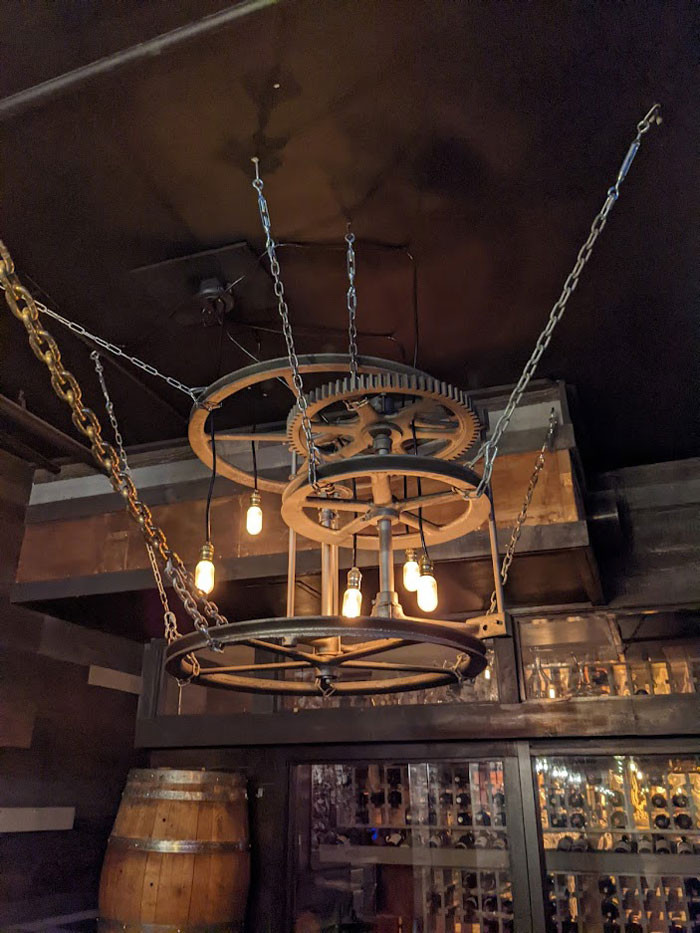 16. This light fixture that looks like some sort of machinery.