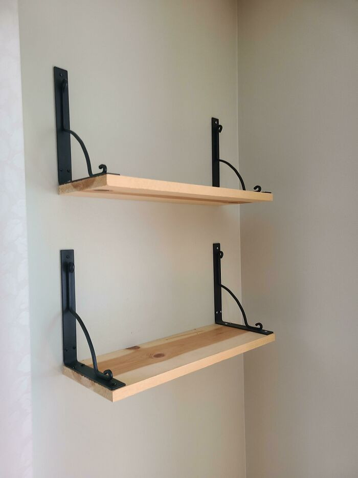 11. Inverted Ekby Hall Wall brackets to create natural bookends for the shelf