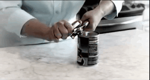 5. Using a handheld can opener