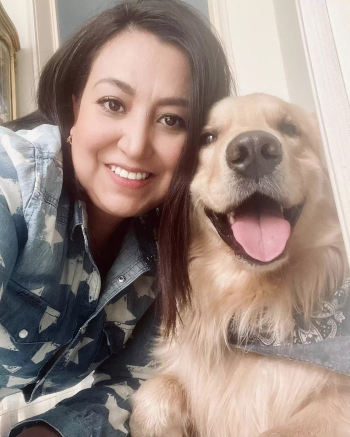 Sandy and her adorable Golden Retriever