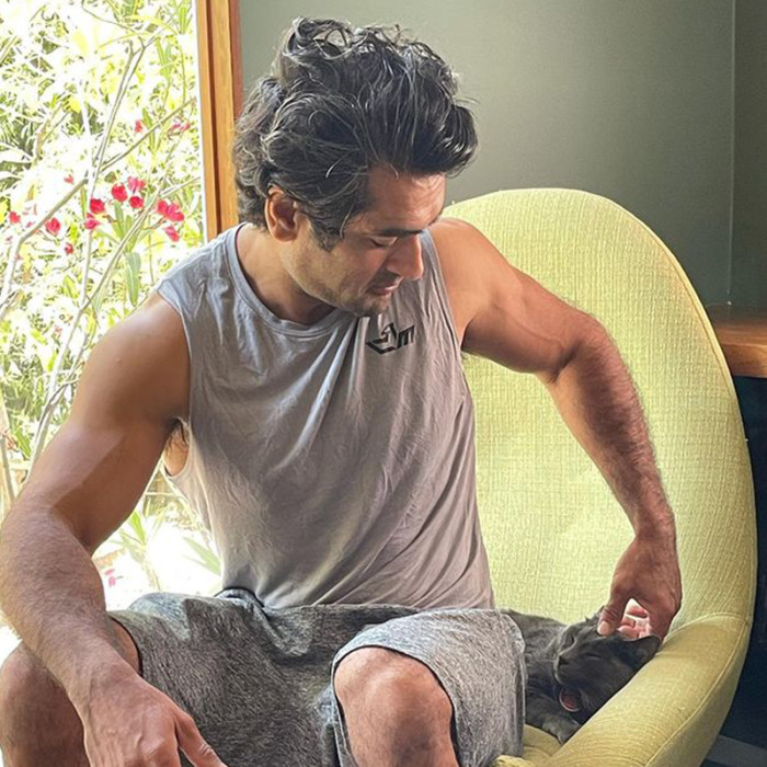 Bagel taking over Kumail’s favorite green chair