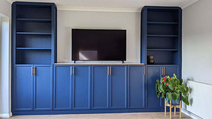 41. Customized Billy bookcase and TV wall centerpiece