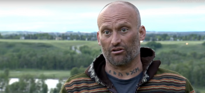 Then they spotted a female moose calf opposite them, just above river level, curled up in the area of a cliff shelf.