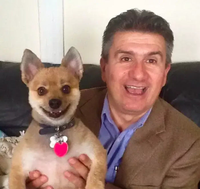 11. This little pup and his hooman are sharing a smile