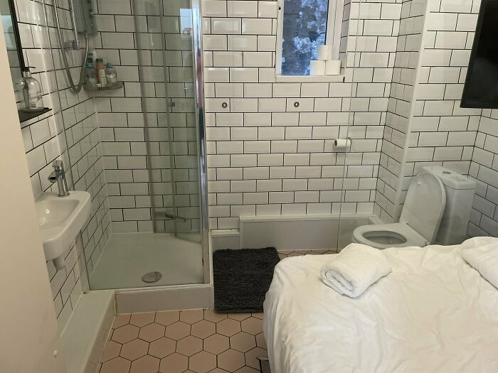 He posted the photo of a bathroom with a bed.