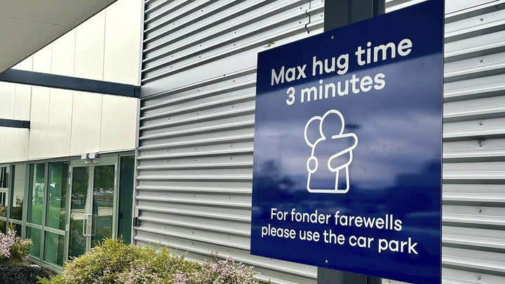 As you can see here they have a sign plain as day explaining their limit on goodbye hugs.