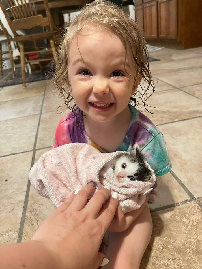 "My Daughter And The Kitten We Saved In The Rain"