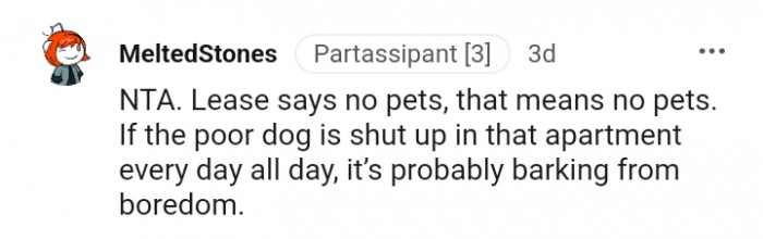 The dog is probably barking as a result of boredom