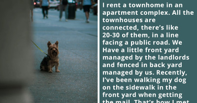 A Person Lets Their Dog Pee on a Lightpole in an Apartment Complex, but a Neighbor Is Upset and Claims It's Her Lightpole