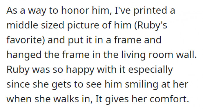 Ruby's favorite pet, Tic, passed away, but she wanted to pay tribute to the dog by hanging up a photo of him on their living room wall.