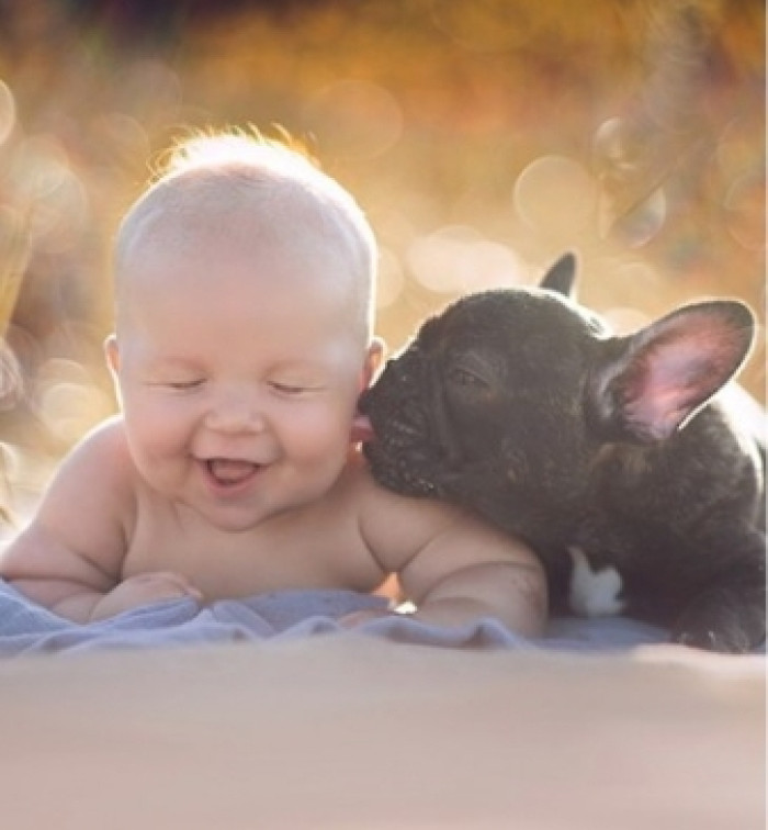 Cuteness overload is the only thing that can happen when a baby and a dog born on the same day grow up together
