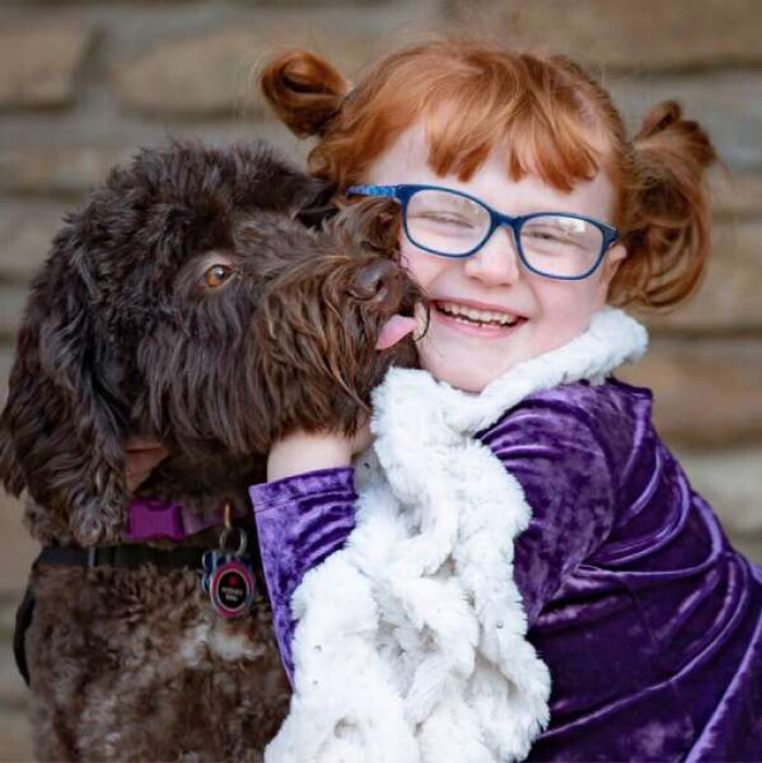 Meet service dog Ariel and her best friend Hadley Jo — Her smile is so contagious