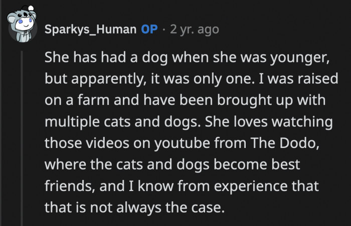 His girlfriend is convinced Sparky and the new dog will get along after watching YouTube videos where they become the best of friends, which again, will not always be the case
