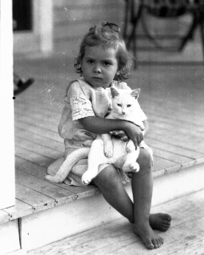 3. Just a Little Girl and Her Cat.