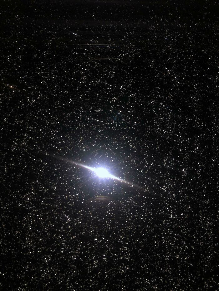 5. I Took A Picture Of A Window With Rain On It And It Looks Like A Planet Surrounded By Millions Of Stars