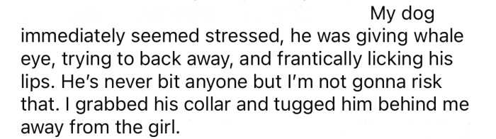 The OP's dog seemed stressed, so she grabbed his collar and pulled him away from the little girl.